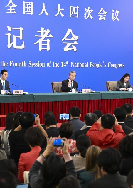 (260308) -- BEIJING, March 8, 2026 (Xinhua) -- Chinese Foreign Minister Wang Yi, also a member of the Political Bureau of the Communist Party of China Central Committee, attends a press conference on China's foreign policy and external relations on the sidelines of the fourth session of the 14th National People's Congress (NPC) in Beijing, capital of China, March 8, 2026. (Xinhua/Cao Yiming)