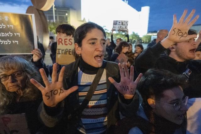 (260308) -- TEL AVIV, March 8, 2026 (Xinhua) -- People take part in a rally at a square to protest against U.S. and Israeli military attacks on Iran and demand an immediate end to all acts of war in Tel Aviv, Israel, March 7, 2026. (Photo by Jamal Awad/Xinhua)