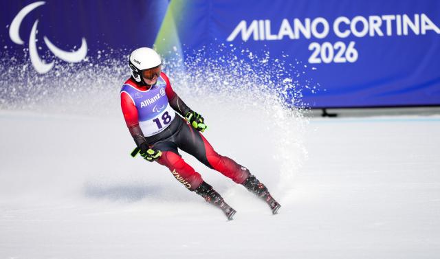 (260308) -- CORTINA D'AMPEZZO, March 8, 2026 (Xinhua) -- Zhu Wenjing of China competes during the para alpine skiing women's downhill standing match at the Milan-Cortina 2026 Paralympic Winter Games in Cortina D'ampezzo, Italy, March 7, 2026. (Xinhua/Wang Kaiyan)