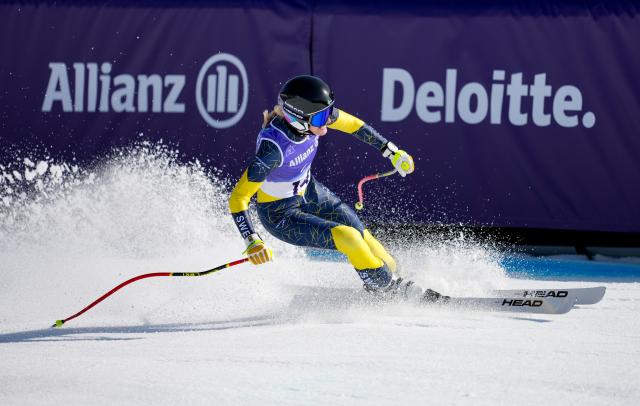 (260308) -- CORTINA D'AMPEZZO, March 8, 2026 (Xinhua) -- Ebba Aarsjoe of Sweden competes during the para alpine skiing women's downhill standing match at the Milan-Cortina 2026 Paralympic Winter Games in Cortina D'ampezzo, Italy, March 7, 2026. (Xinhua/Wang Kaiyan)