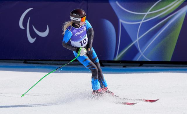 (260308) -- CORTINA D'AMPEZZO, March 8, 2026 (Xinhua) -- Varvara Voronchikhina of Russia competes during the para alpine skiing women's downhill standing match at the Milan-Cortina 2026 Paralympic Winter Games in Cortina D'ampezzo, Italy, March 7, 2026. (Xinhua/Wang Kaiyan)