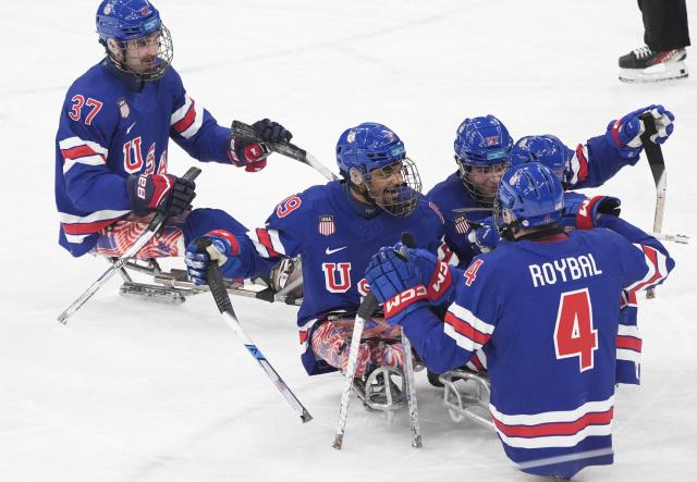 (260308) -- MILAN, March 8, 2026 (Xinhua) -- Players of the United States celebrate scoring during the Para Ice Hockey Preliminary Round Group A match between the United States and Italy at the Milan-Cortina 2026 Paralympic Winter Games in Milan, Italy, March 7, 2026. (Xinhua/Hou Jun)