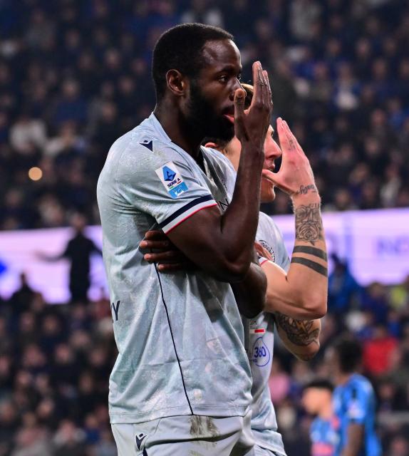 (260308) -- BERGAMO, March 8, 2026 (Xinhua) -- Udinese's Keinan Davis (L) celebrates his goal during a Serie A football match between Atalanta and Udinese in Bergamo, Italy, March 7, 2026. (Photo by Alberto Lingria/Xinhua)