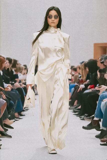 (260308) -- PARIS, March 8, 2026 (Xinhua) -- A model presents a creation from the ready-to-wear Fall/Winter 2026-2027 collections by Celine during the Paris Fashion Week in Paris, France, March 7, 2026. (MeetEurope/Handout via Xinhua)