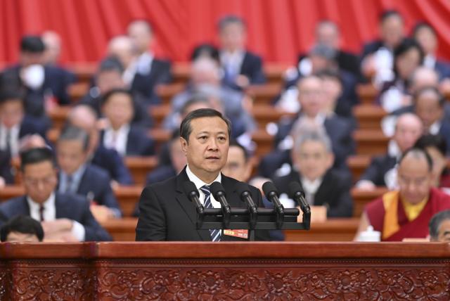 (260308) -- BEIJING, March 8, 2026 (Xinhua) -- Lian Yimin, a member of the 14th National Committee of the Chinese People's Political Consultative Conference (CPPCC), speaks at the third plenary meeting of the fourth session of the 14th CPPCC National Committee at the Great Hall of the People in Beijing, capital of China, March 8, 2026. (Xinhua/Yue Yuewei)