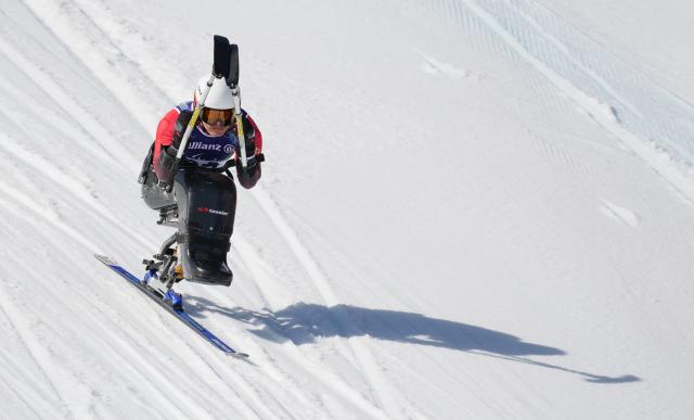 (260308) -- CORTINA D'AMPEZZO, March 8, 2026 (Xinhua) -- Liang Zilu of China competes during the para alpine skiing men's downhill sitting match at the Milan-Cortina 2026 Paralympic Winter Games in Cortina D'ampezzo, Italy, March 7, 2026. (Xinhua/Wang Kaiyan)