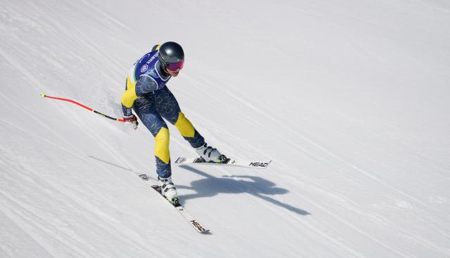 (260308) -- CORTINA D'AMPEZZO, March 8, 2026 (Xinhua) -- Aaron Lindstroem of Sweden competes during the para alpine skiing men's downhill standing match at the Milan-Cortina 2026 Paralympic Winter Games in Cortina D'ampezzo, Italy, March 7, 2026. (Xinhua/Wang Kaiyan)