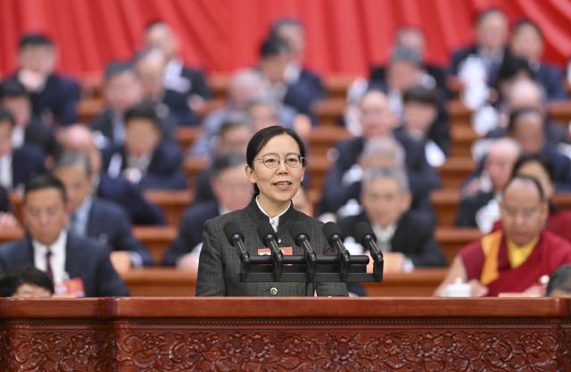 (260308) -- BEIJING, March 8, 2026 (Xinhua) -- Chen Xingying, a member of the 14th National Committee of the Chinese People's Political Consultative Conference (CPPCC), speaks on behalf of the Central Committee of the Revolutionary Committee of the Chinese Kuomintang at the third plenary meeting of the fourth session of the 14th CPPCC National Committee at the Great Hall of the People in Beijing, capital of China, March 8, 2026. (Xinhua/Yue Yuewei)