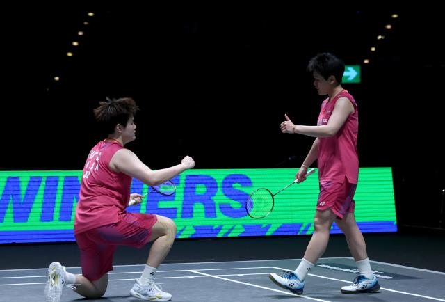 (260308) -- BIRMINGHAM, March 8, 2026 (Xinhua) -- Liu Shengshu (L) and Tan Ning celebrate after the women's doubles semifinal match between Liu Shengshu/Tan Ning of China and Jia Yifan/Zhang Shuxian of China at the All England Open Badminton Championships 2026 in Birmingham, Britain, March 7, 2026. (Xinhua/Li Ying)