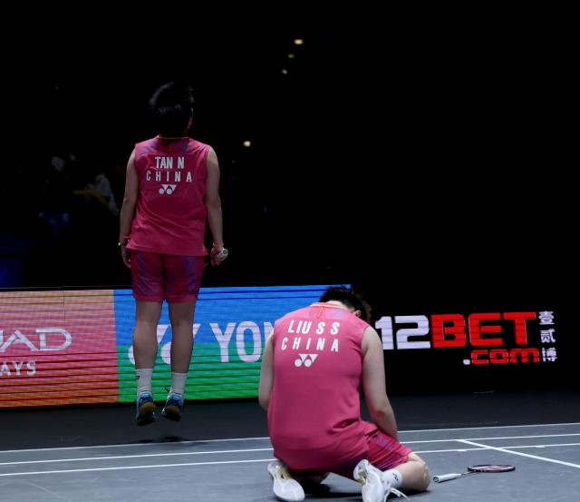 (260308) -- BIRMINGHAM, March 8, 2026 (Xinhua) -- Liu Shengshu (R) and Tan Ning celebrate after the women's doubles semifinal match between Liu Shengshu/Tan Ning of China and Jia Yifan/Zhang Shuxian of China at the All England Open Badminton Championships 2026 in Birmingham, Britain, March 7, 2026. (Xinhua/Li Ying)