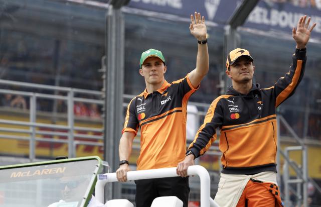 (260308) -- MELBOURNE, March 8, 2026 (Xinhua) -- McLaren's Oscar Piastri (L) of Australia and Lando Norris of Britain are seen during the Drivers' Parade before the Formula One Australia Grand Prix at Albert Park in Melbourne, Australia, March 8, 2026. (Xinhua/Ma Ping)