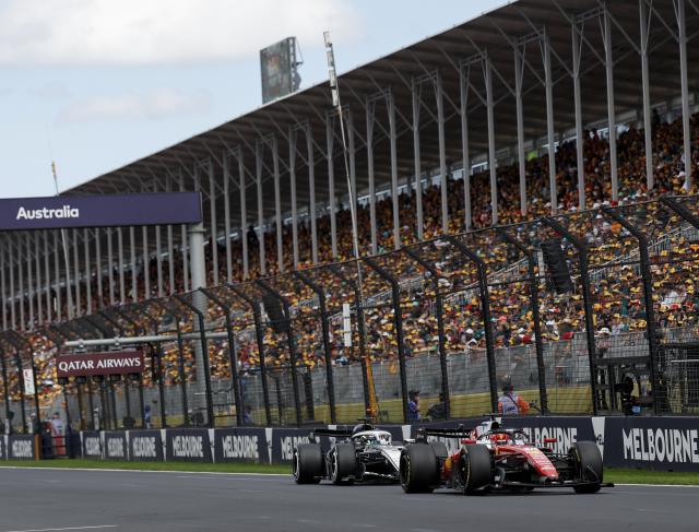 (260308) -- MELBOURNE, March 8, 2026 (Xinhua) -- Ferrari's Charles Leclerc (front) of Monaco and Cadillac's Sergio Perez of Mexico compete during the Formula One Australia Grand Prix at Albert Park in Melbourne, Australia, March 8, 2026. (Xinhua/Ma Ping)