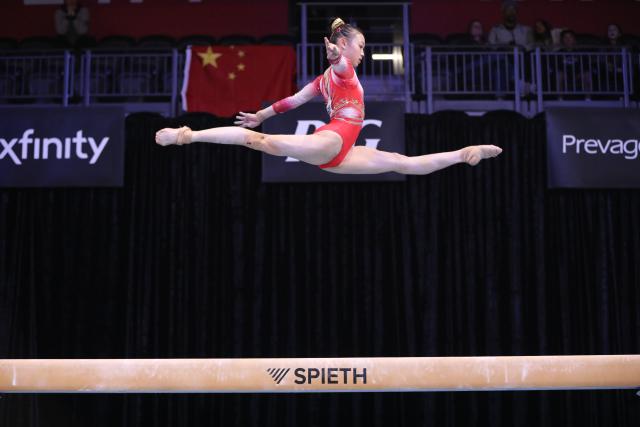(260308) -- NEVADA, March 8, 2026 (Xinhua) -- Ke Qinqin of China competes during the women's balance beam at the USA Gymnastics American Cup Mixed Team in Nevada, the United States, March 7, 2026. (Photo by Zeng Hui/Xinhua)