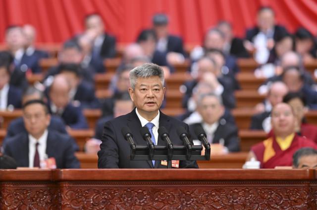 (260308) -- BEIJING, March 8, 2026 (Xinhua) -- Xu Xinrong, a member of the 14th National Committee of the Chinese People's Political Consultative Conference (CPPCC), speaks at the third plenary meeting of the fourth session of the 14th CPPCC National Committee at the Great Hall of the People in Beijing, capital of China, March 8, 2026. (Xinhua/Zhang Ling)