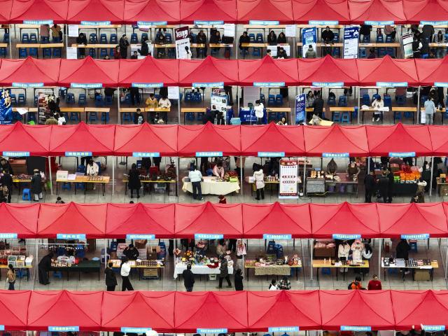 (260308) -- BEIJING, March 8, 2026 (Xinhua) -- An aerial drone photo taken on March 8, 2026 shows a job fair dedicated to the female in Jiyuan City, central China's Henan Province. Various events were held across China on Sunday to mark the International Women's Day. (Photo by Miao Qiunao/Xinhua)