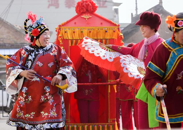 (260308) -- BEIJING, March 8, 2026 (Xinhua) -- Villagers perform in celebration of the International Women's Day in Bo'ai County of Jiaozuo City, central China's Henan Province, March 8, 2026. Various events were held across China on Sunday to mark the International Women's Day. (Photo by Cheng Quan/Xinhua)