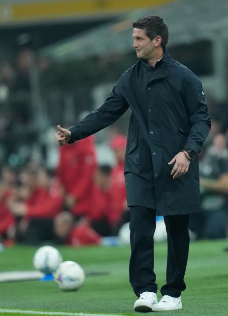 (260309) -- MILAN, March 9, 2026 (Xinhua) -- Inter Milan's head coach Cristian Chivu gestures during an Italian Serie A football match between AC Milan and Inter Milan in Milan, Italy, March 8, 2026. (Xinhua/Li Jing)