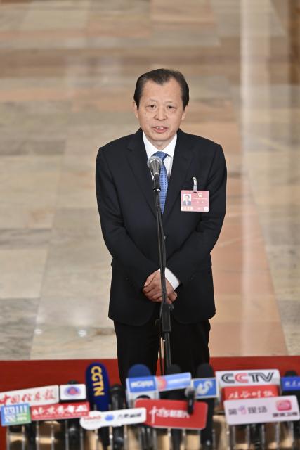 (260309) -- BEIJING, March 9, 2026 (Xinhua) -- Chinese Minister of Transport Liu Wei gives an interview after the second plenary meeting of the fourth session of the 14th National People's Congress (NPC) at the Great Hall of the People in Beijing, capital of China, March 9, 2026. (Xinhua/Li Xin)