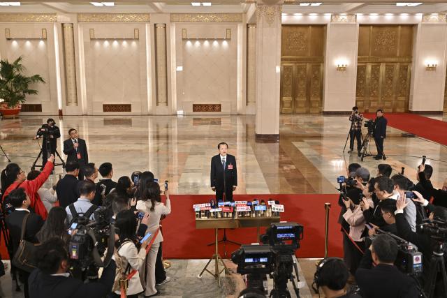 (260309) -- BEIJING, March 9, 2026 (Xinhua) -- Chinese Minister of Transport Liu Wei gives an interview after the second plenary meeting of the fourth session of the 14th National People's Congress (NPC) at the Great Hall of the People in Beijing, capital of China, March 9, 2026. (Xinhua/Li Xin)