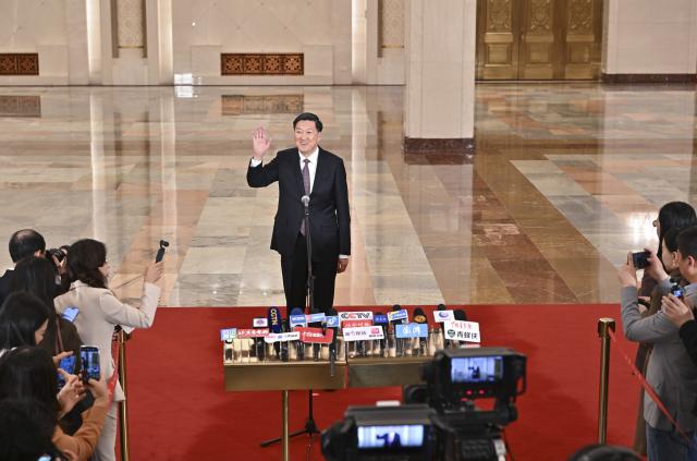(260309) -- BEIJING, March 9, 2026 (Xinhua) -- Gao Zhidan, director of China's General Administration of Sport, gives an interview after the second plenary meeting of the fourth session of the 14th National People's Congress (NPC) at the Great Hall of the People in Beijing, capital of China, March 9, 2026. (Xinhua/Li Xin)