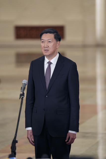 (260309) -- BEIJING, March 9, 2026 (Xinhua) -- Gao Zhidan, director of China's General Administration of Sport, gives an interview after the second plenary meeting of the fourth session of the 14th National People's Congress (NPC) at the Great Hall of the People in Beijing, capital of China, March 9, 2026. (Xinhua/Li Minggang)