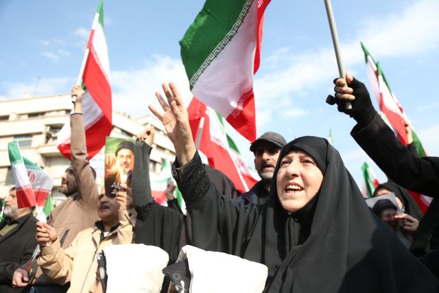 (260309) -- TEHRAN, March 9, 2026 (Xinhua) -- People attend gatherings to pledge allegiance to Iran's new Supreme Leader Mojtaba Khamenei at Enghelab Square in Tehran, Iran, on March 9, 2026. (Xinhua/Shadati)
