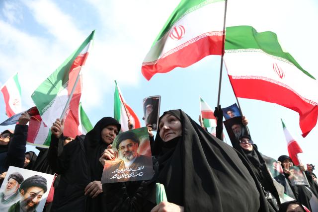 (260309) -- TEHRAN, March 9, 2026 (Xinhua) -- People attend gatherings to pledge allegiance to Iran's new Supreme Leader Mojtaba Khamenei at Enghelab Square in Tehran, Iran, on March 9, 2026. (Xinhua/Shadati)