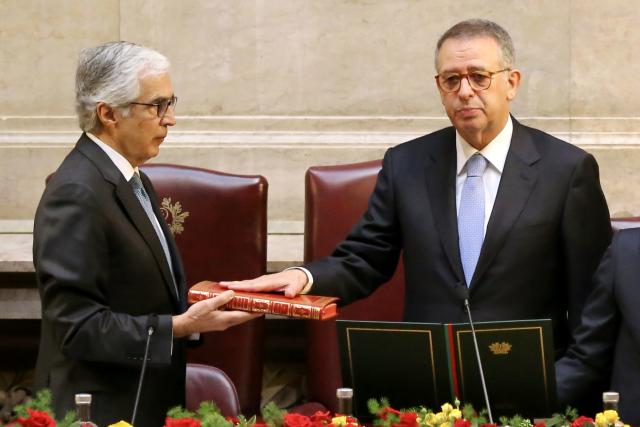 (260310) -- BEIJING, March 10, 2026 (Xinhua) -- Portugal's new president Antonio Jose Seguro (R) is sworn in during a ceremony at the Assembly of the Republic in Lisbon, Portugal, on March 9, 2026. Seguro was sworn in as Portugal's new president on Monday during a ceremony at the Assembly of the Republic, formally beginning his mandate after winning the country's presidential runoff election. (Xinhua/Xun Wei)
