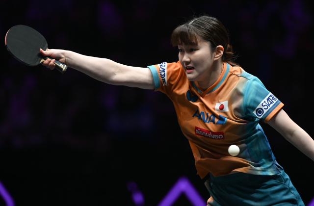 (260310) -- CHONGQING, March 10, 2026 (Xinhua) -- Satsuki Odo of Japan hits a return during the women's singles round of 32 match against Wang Manyu of China at the WTT Champions Chongqing 2026 in southwest China's Chongqing, March 10, 2026. (Xinhua/Chen Cheng)