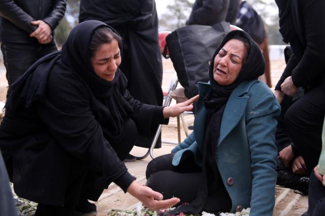 (260310) -- TEHRAN, March 10, 2026 (Xinhua) -- People mourn at a funeral held for people who lost their lives during strikes launched by the United States and Israel against Iran, at Behesht-e Zahra cemetery in Tehran, Iran, on March 9, 2026. (Xinhua)