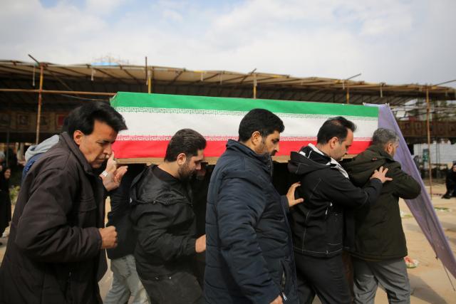 (260310) -- TEHRAN, March 10, 2026 (Xinhua) -- A funeral is held for people who lost their lives during strikes launched by the United States and Israel against Iran, at Behesht-e Zahra cemetery in Tehran, Iran, on March 9, 2026. (Xinhua)