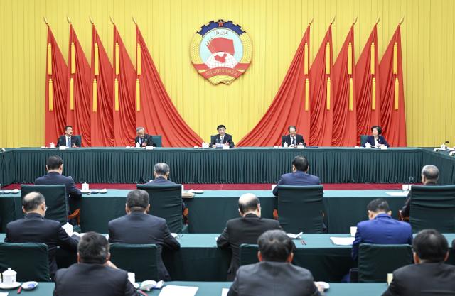 (260310) -- BEIJING, March 10, 2026 (Xinhua) -- Wang Huning, a member of the Standing Committee of the Political Bureau of the Communist Party of China (CPC) Central Committee and chairman of the Chinese People's Political Consultative Conference (CPPCC) National Committee, presides over the 48th Chairperson's Council meeting of the 14th CPPCC National Committee, in Beijing, capital of China, March 10, 2026. (Xinhua/Zhang Ling)