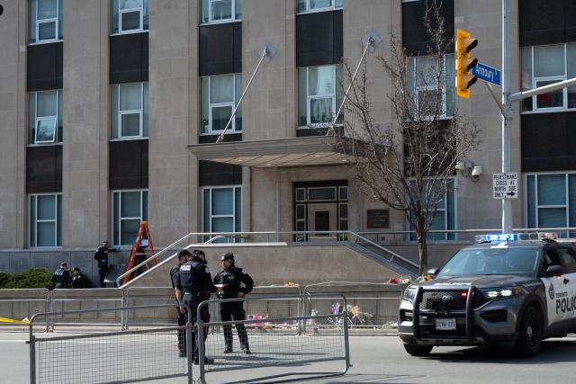 (260310) -- TORONTO, March 10, 2026 (Xinhua) -- Toronto police work at the scene of a shooting incident in Toronto, Canada, on March 10, 2026. Toronto police said Tuesday they are investigating a shooting incident targeting the U.S. consulate in the largest city in Canada. No injuries were reported, police said, adding that they did not have information on a suspect. (Photo by Li Haitao/Xinhua)