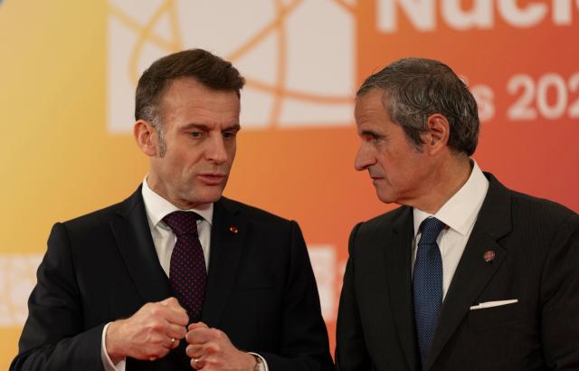 (260310) -- PARIS, March 10, 2026 (Xinhua) -- French President Emmanuel Macron talks with International Atomic Energy Agency Director General Rafael Grossi before the second Nuclear Energy Summit in Paris, France, on March 10, 2026. Macron on Tuesday called on both public and private sectors to step up investment in the development of civil nuclear energy. (Xinhua/Wu Huiwo)