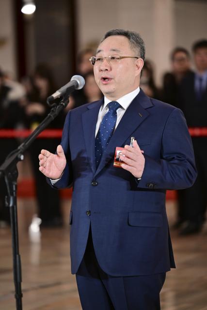 (260311) -- BEIJING, March 11, 2026 (Xinhua) -- Cui Haiyang, a member of the 14th National Committee of the Chinese People's Political Consultative Conference (CPPCC), attends a group interview ahead of the closing meeting of the fourth session of the 14th CPPCC National Committee at the Great Hall of the People in Beijing, capital of China, March 11, 2026. (Xinhua/Chen Yehua)