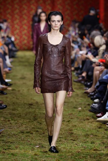 (260311) -- PARIS, March 11, 2026 (Xinhua) -- A model presents a creation from the Ready-to-Wear Fall/Winter 2026-2027 collections by Miu Miu during the Paris Fashion Week, in Paris, France, on March 10, 2026. (MeetEurope/Handout via Xinhua)