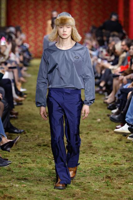 (260311) -- PARIS, March 11, 2026 (Xinhua) -- A model presents a creation from the Ready-to-Wear Fall/Winter 2026-2027 collections by Miu Miu during the Paris Fashion Week, in Paris, France, on March 10, 2026. (MeetEurope/Handout via Xinhua)