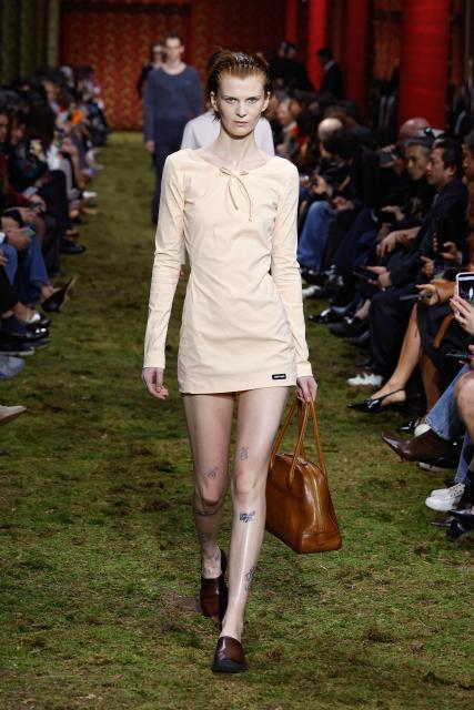 (260311) -- PARIS, March 11, 2026 (Xinhua) -- A model presents a creation from the Ready-to-Wear Fall/Winter 2026-2027 collections by Miu Miu during the Paris Fashion Week, in Paris, France, on March 10, 2026. (MeetEurope/Handout via Xinhua)