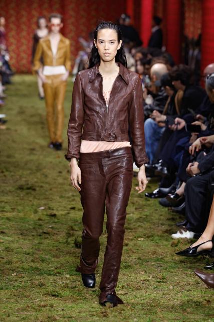 (260311) -- PARIS, March 11, 2026 (Xinhua) -- A model presents a creation from the Ready-to-Wear Fall/Winter 2026-2027 collections by Miu Miu during the Paris Fashion Week, in Paris, France, on March 10, 2026. (MeetEurope/Handout via Xinhua)