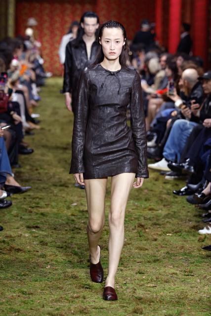 (260311) -- PARIS, March 11, 2026 (Xinhua) -- A model presents a creation from the Ready-to-Wear Fall/Winter 2026-2027 collections by Miu Miu during the Paris Fashion Week, in Paris, France, on March 10, 2026. (MeetEurope/Handout via Xinhua)