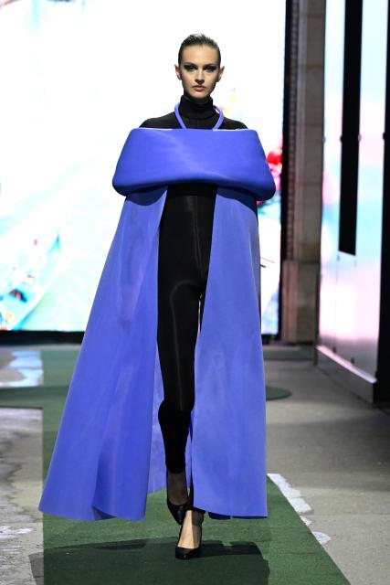 (260311) -- PARIS, March 11, 2026 (Xinhua) -- A model presents a creation from the Ready-to-Wear Fall/Winter 2026-2027 collections by Pierre Cardin during the Paris Fashion Week in Paris, France, on March 10, 2026. (MeetEurope/Handout via Xinhua)