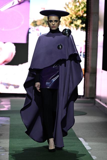 (260311) -- PARIS, March 11, 2026 (Xinhua) -- A model presents a creation from the Ready-to-Wear Fall/Winter 2026-2027 collections by Pierre Cardin during the Paris Fashion Week in Paris, France, on March 10, 2026. (MeetEurope/Handout via Xinhua)