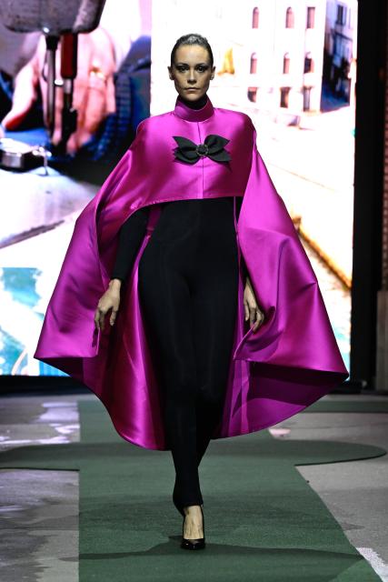 (260311) -- PARIS, March 11, 2026 (Xinhua) -- A model presents a creation from the Ready-to-Wear Fall/Winter 2026-2027 collections by Pierre Cardin during the Paris Fashion Week in Paris, France, on March 10, 2026. (MeetEurope/Handout via Xinhua)