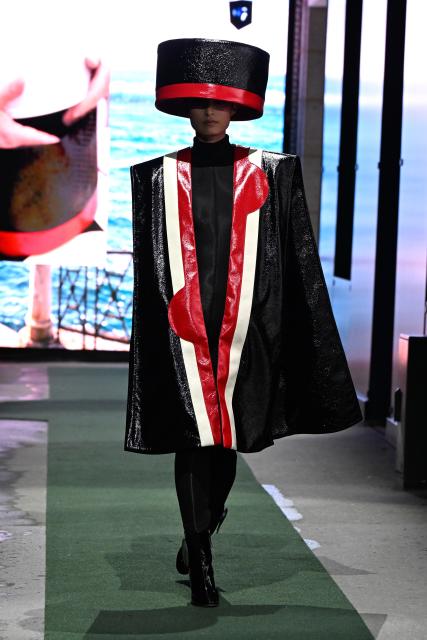 (260311) -- PARIS, March 11, 2026 (Xinhua) -- A model presents a creation from the Ready-to-Wear Fall/Winter 2026-2027 collections by Pierre Cardin during the Paris Fashion Week in Paris, France, on March 10, 2026. (MeetEurope/Handout via Xinhua)