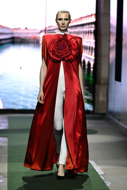 (260311) -- PARIS, March 11, 2026 (Xinhua) -- A model presents a creation from the Ready-to-Wear Fall/Winter 2026-2027 collections by Pierre Cardin during the Paris Fashion Week in Paris, France, on March 10, 2026. (MeetEurope/Handout via Xinhua)