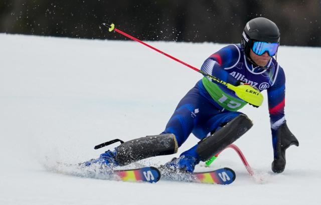 (260311) -- CORTINA D'AMPEZZO, March 11, 2026 (Xinhua) -- Oscar Burnham of France competes during the Para Alpine Skiing Men's Alpine Combined Standing event at the Milan-Cortina 2026 Paralympic Winter Games in Cortina D'ampezzo, Italy, March 10, 2026. (Xinhua/Wang Kaiyan)