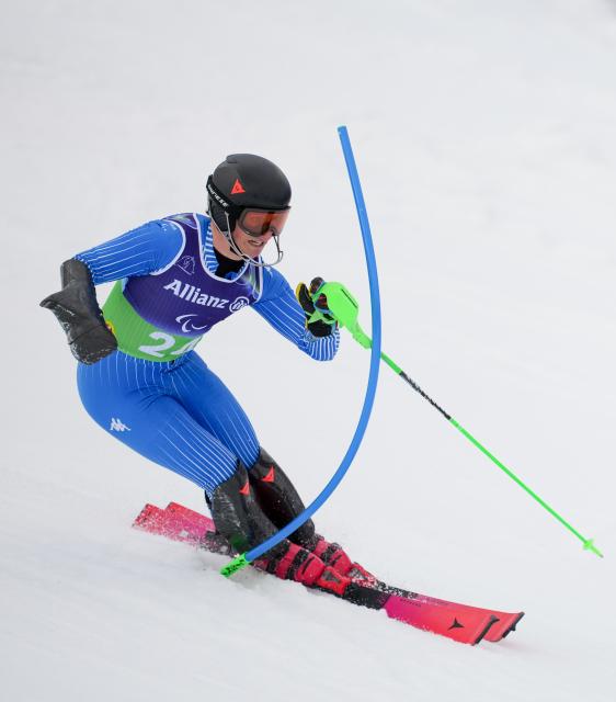 (260311) -- CORTINA D'AMPEZZO, March 11, 2026 (Xinhua) -- Federico Pelizzari of Italy competes during the Para Alpine Skiing Men's Alpine Combined Standing event at the Milan-Cortina 2026 Paralympic Winter Games in Cortina D'ampezzo, Italy, March 10, 2026. (Xinhua/Wang Kaiyan)