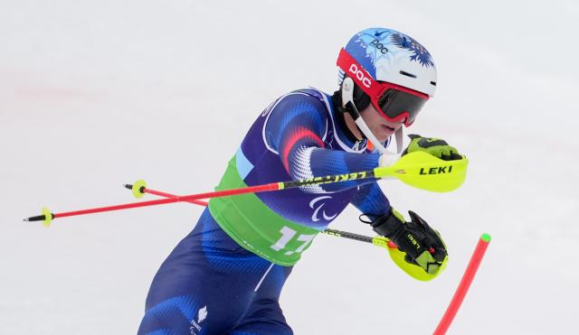 (260311) -- CORTINA D'AMPEZZO, March 11, 2026 (Xinhua) -- Arthur Bauchet of France competes during the Para Alpine Skiing Men's Alpine Combined Standing event at the Milan-Cortina 2026 Paralympic Winter Games in Cortina D'ampezzo, Italy, March 10, 2026. (Xinhua/Wang Kaiyan)