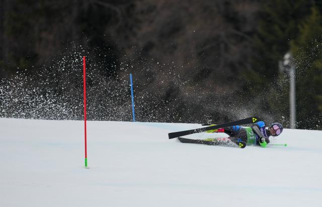 (260311) -- CORTINA D'AMPEZZO, March 11, 2026 (Xinhua) -- Aleksei Bugaev of Russia falls during the Para Alpine Skiing Men's Alpine Combined Standing event at the Milan-Cortina 2026 Paralympic Winter Games in Cortina D'ampezzo, Italy, March 10, 2026. (Xinhua/Wang Kaiyan)