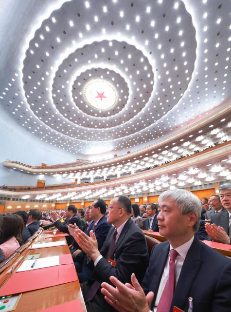 (260311) -- BEIJING, March 11, 2026 (Xinhua) -- The closing meeting of the fourth session of the 14th National Committee of the Chinese People's Political Consultative Conference (CPPCC) is held at the Great Hall of the People in Beijing, capital of China, March 11, 2026. (Xinhua/Ding Lin)